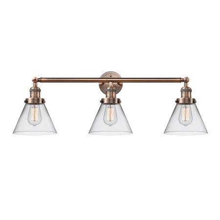 A large image of the Innovations Lighting 205-S Large Cone Antique Copper / Clear