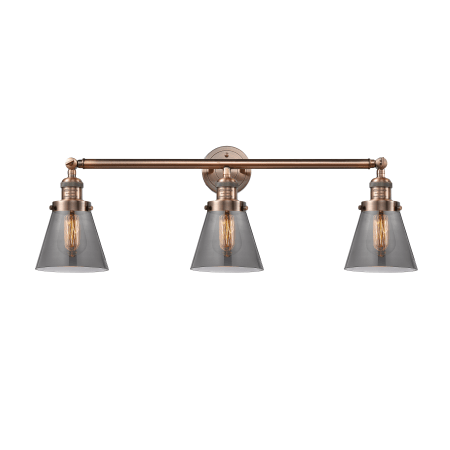 A large image of the Innovations Lighting 205-S Small Cone Antique Copper / Smoked