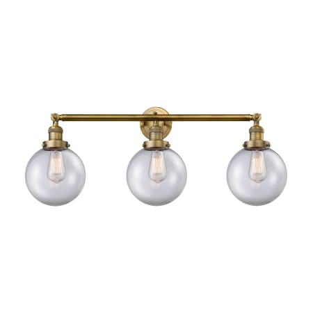 A large image of the Innovations Lighting 205-S-8 Beacon Brushed Brass / Clear