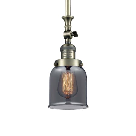 A large image of the Innovations Lighting 206 Small Bell Antique Brass / Plated Smoked