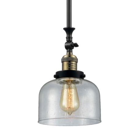 A large image of the Innovations Lighting 206 Large Bell Black / Antique Brass / Seedy