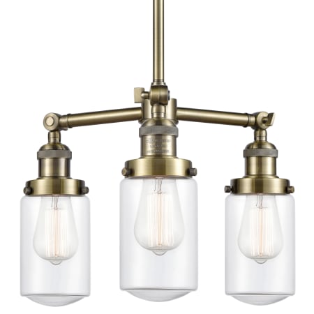 A large image of the Innovations Lighting 207 Dover Antique Brass / Clear
