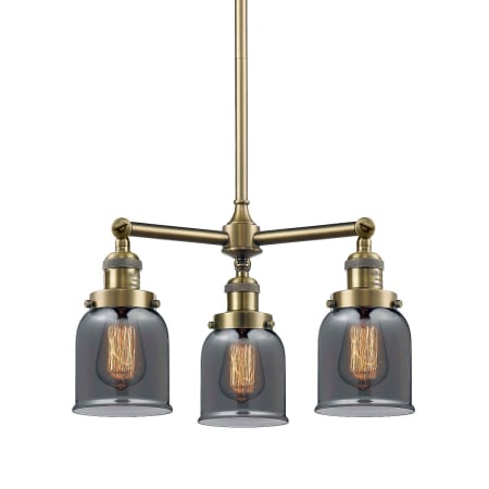 A large image of the Innovations Lighting 207 Small Bell Antique Brass / Plated Smoked