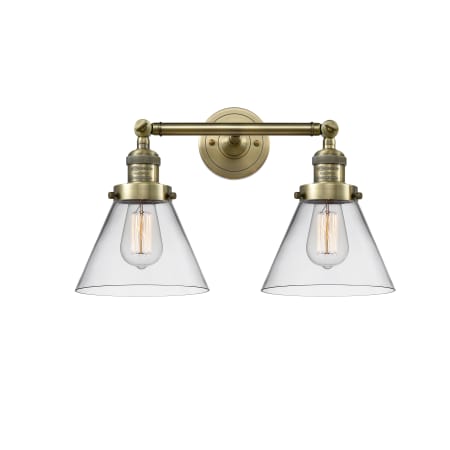 A large image of the Innovations Lighting 208 Large Cone Antique Brass / Clear