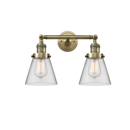 A large image of the Innovations Lighting 208 Small Cone Antique Brass / Clear