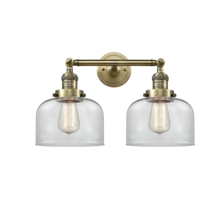 A large image of the Innovations Lighting 208 Large Bell Antique Brass / Clear