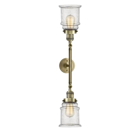 A large image of the Innovations Lighting 208L Canton Antique Brass / Seedy