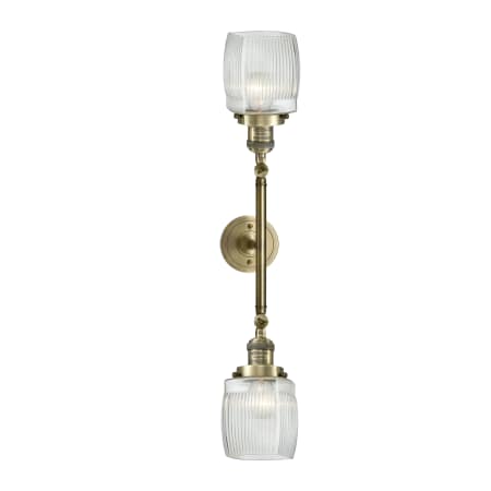 A large image of the Innovations Lighting 208L Colton Antique Brass / Thick Clear Halophane