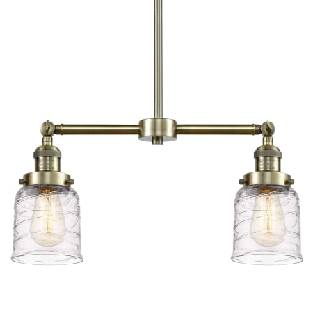 A large image of the Innovations Lighting 209-10-21 Bell Linear Antique Brass / Deco Swirl