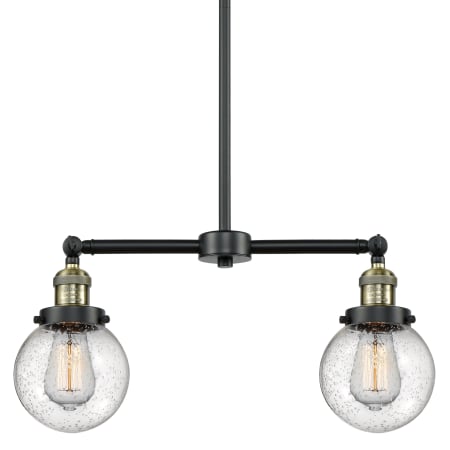 A large image of the Innovations Lighting 209-6 Beacon Black / Antique Brass / Seedy Globe