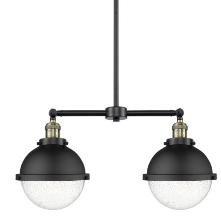 A large image of the Innovations Lighting 209-13-18 Hampden Linear Black Antique Brass / Seedy