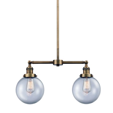 A large image of the Innovations Lighting 209-8 Beacon Brushed Brass / Clear