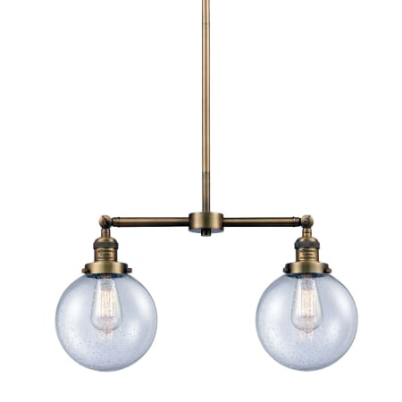 A large image of the Innovations Lighting 209-8 Beacon Brushed Brass / Seedy