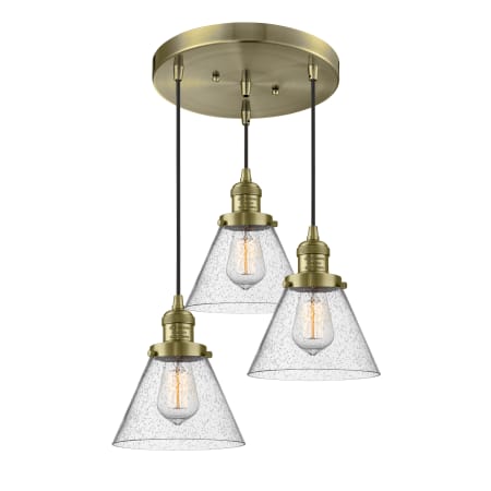 A large image of the Innovations Lighting 211/3 Large Cone Antique Brass / Seedy