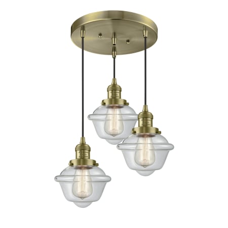 A large image of the Innovations Lighting 211/3 Small Oxford Antique Brass / Clear