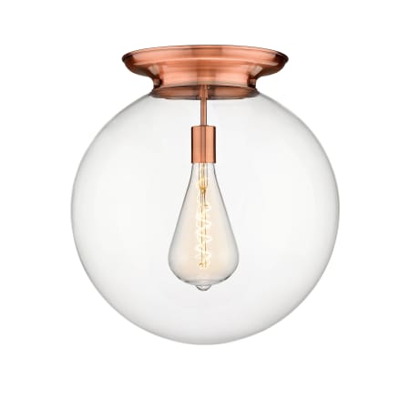 A large image of the Innovations Lighting 221-1F-20-18 Beacon Flush Antique Copper / Clear