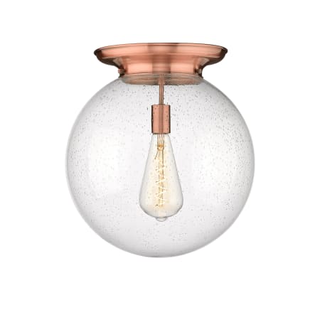 A large image of the Innovations Lighting 221-1F-18-16 Beacon Flush Antique Copper / Seedy