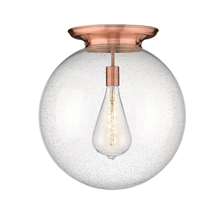 A large image of the Innovations Lighting 221-1F-20-18 Beacon Flush Antique Copper / Seedy