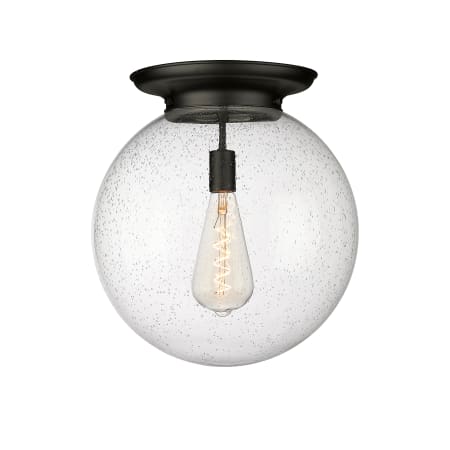 A large image of the Innovations Lighting 221-1F-18-16 Beacon Flush Matte Black / Seedy