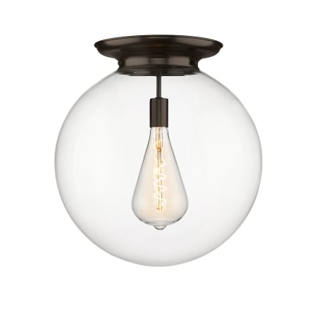 A large image of the Innovations Lighting 221-1F-20-18 Beacon Flush Oiled Brass / Clear