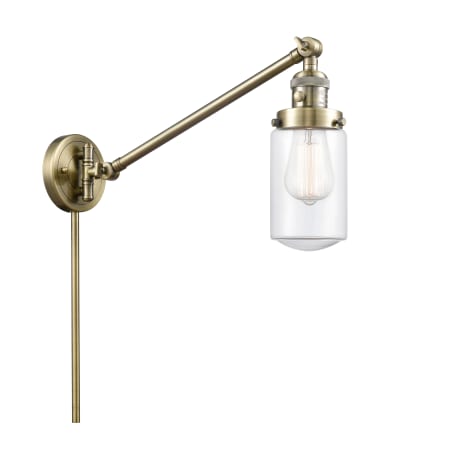 A large image of the Innovations Lighting 237 Dover Antique Brass / Clear