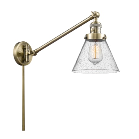 A large image of the Innovations Lighting 237 Large Cone Antique Brass / Seedy