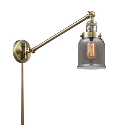A large image of the Innovations Lighting 237 Small Bell Antique Brass / Smoke
