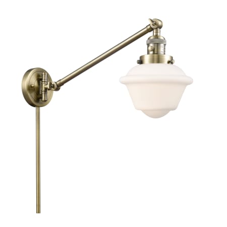 A large image of the Innovations Lighting 237 Small Oxford Antique Brass / Matte White