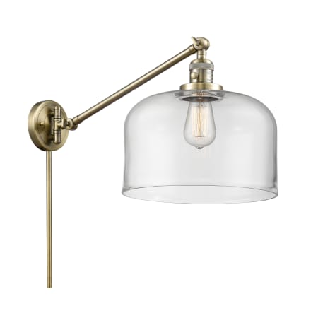 A large image of the Innovations Lighting 237 X-Large Bell Antique Brass / Clear