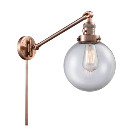 A large image of the Innovations Lighting 237-8 Beacon Antique Copper / Clear