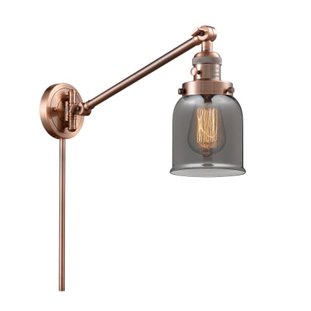 A large image of the Innovations Lighting 237 Small Bell Antique Copper / Plated Smoked