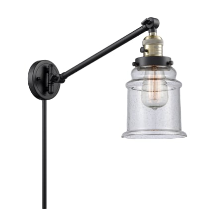 A large image of the Innovations Lighting 237 Canton Black / Antique Brass / Seedy