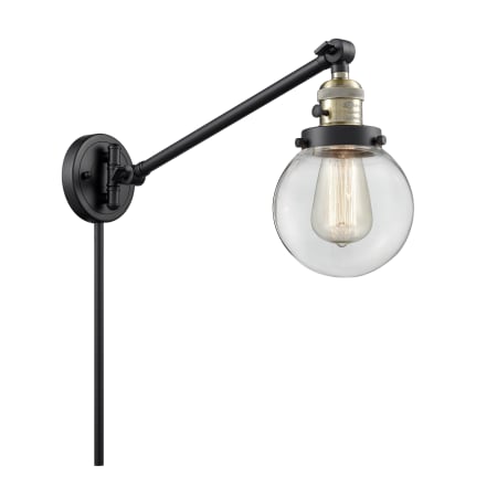 A large image of the Innovations Lighting 237-6 Beacon Black / Antique Brass / Clear