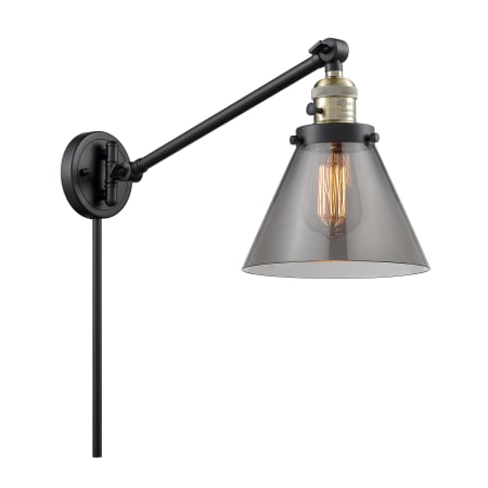 A large image of the Innovations Lighting 237 Large Cone Black / Antique Brass / Smoked