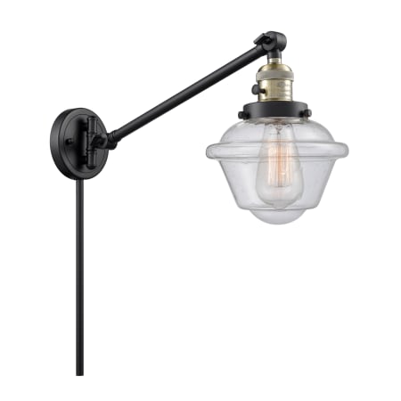 A large image of the Innovations Lighting 237 Small Oxford Black / Antique Brass / Seedy