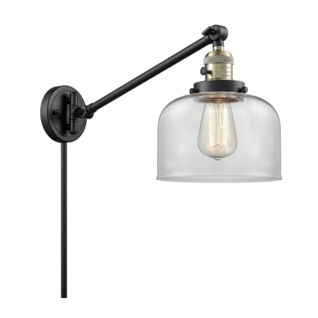 A large image of the Innovations Lighting 237 Large Bell Black / Antique Brass / Clear