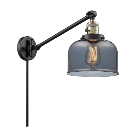A large image of the Innovations Lighting 237 Large Bell Black / Antique Brass / Plated Smoked