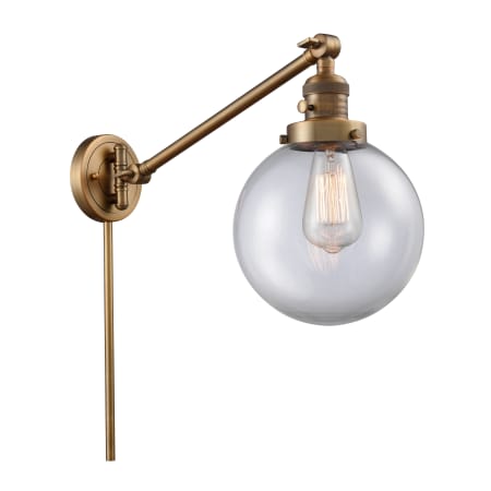 A large image of the Innovations Lighting 237-8 Beacon Brushed Brass / Clear