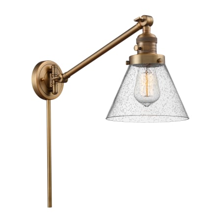 A large image of the Innovations Lighting 237 Large Cone Brushed Brass / Seedy