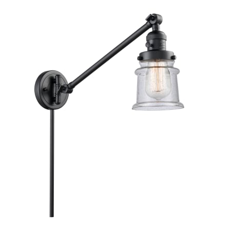 A large image of the Innovations Lighting 237 Small Canton Matte Black / Seedy