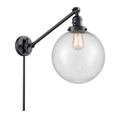 A large image of the Innovations Lighting 237 X-Large Beacon Matte Black / Seedy