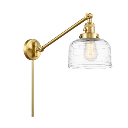 A large image of the Innovations Lighting 237-25-8 Bell Sconce Satin Gold / Clear Deco Swirl