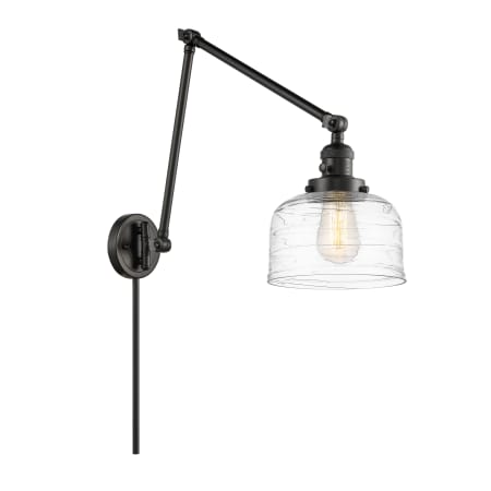 A large image of the Innovations Lighting 238-30-8 Bell Sconce Matte Black / Clear Deco Swirl