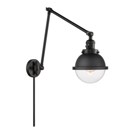 A large image of the Innovations Lighting 238-11-7 Hampden Sconce Matte Black / Clear