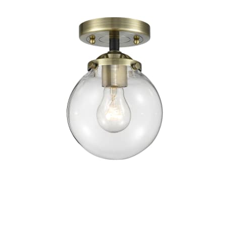 A large image of the Innovations Lighting 284-1C-6 Beacon Black Antique Brass / Clear