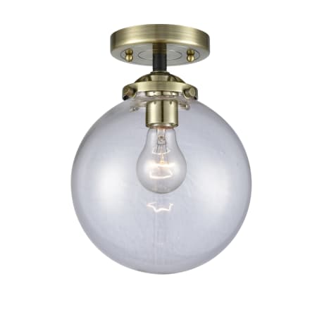 A large image of the Innovations Lighting 284-1C-8 Beacon Black Antique Brass / Clear