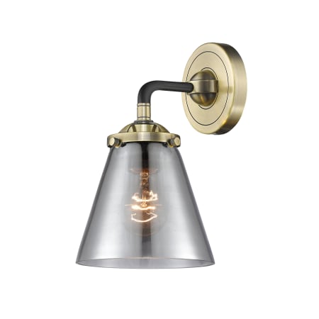 A large image of the Innovations Lighting 284-1W Small Cone Black Antique Brass / Smoked