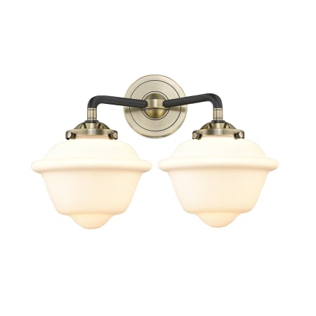 A large image of the Innovations Lighting 284-2W Small Oxford Black Antique Brass / Matte White Cased