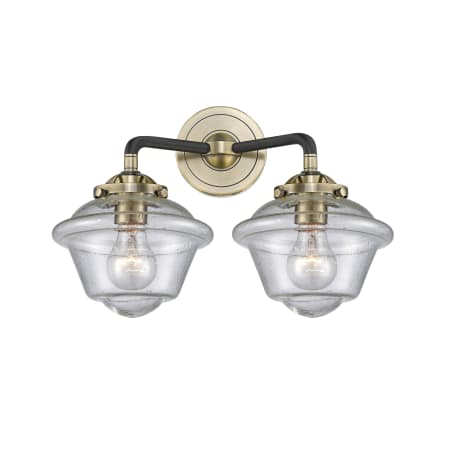 A large image of the Innovations Lighting 284-2W Small Oxford Black Antique Brass / Seedy