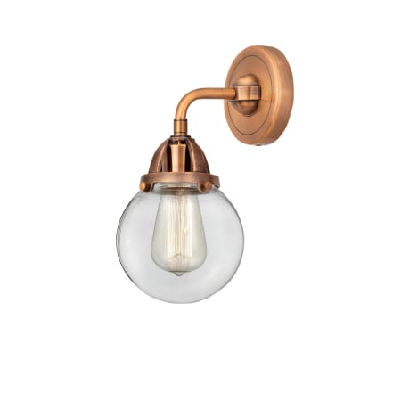 A large image of the Innovations Lighting 288-1W-10-6 Beacon Sconce Antique Copper / Clear